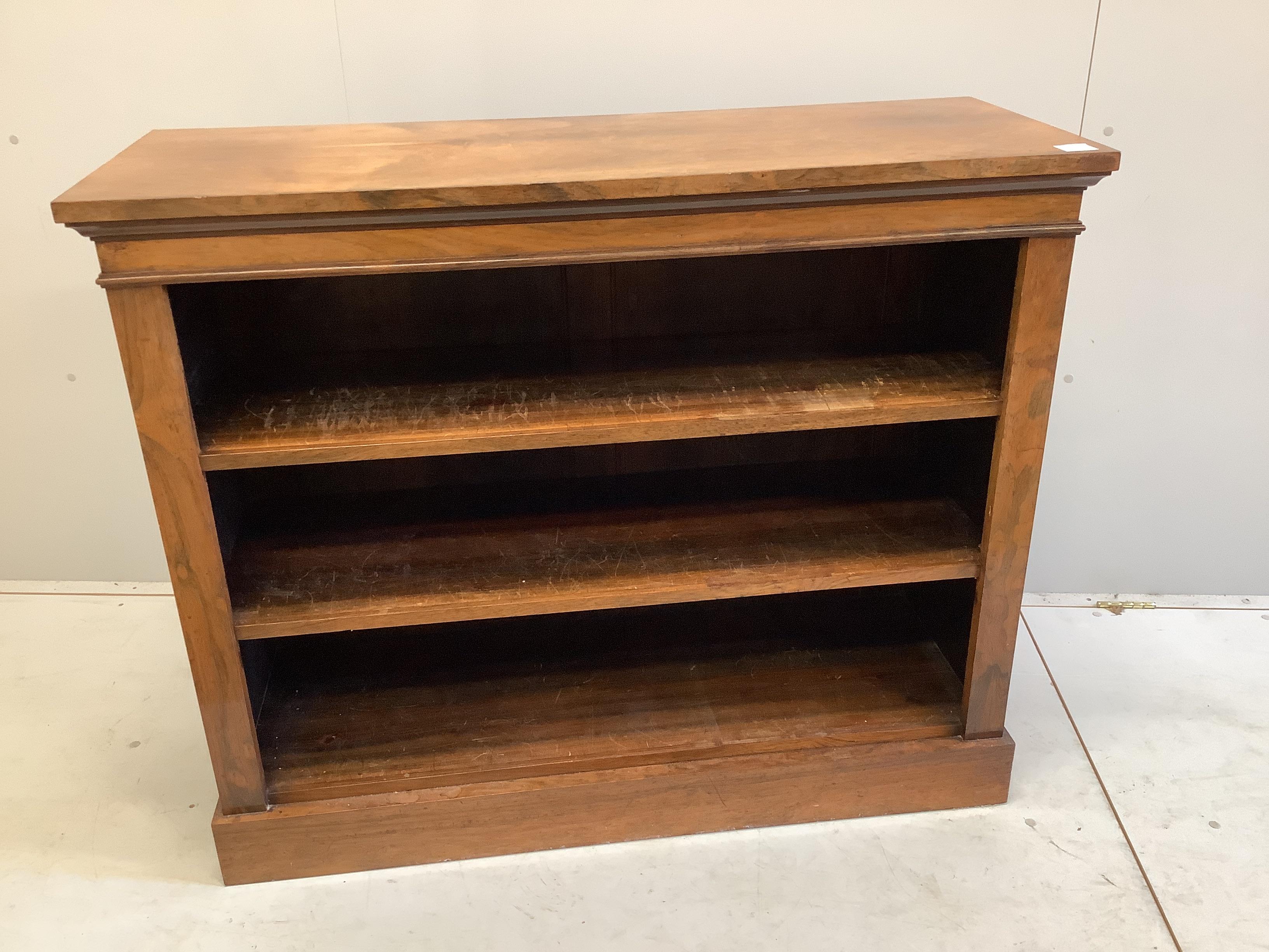 A Victorian faded rosewood open fronted bookcase, width 117cm, depth 44cm, height 97cm